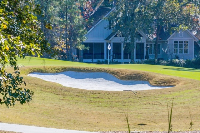 view of pool featuring a yard