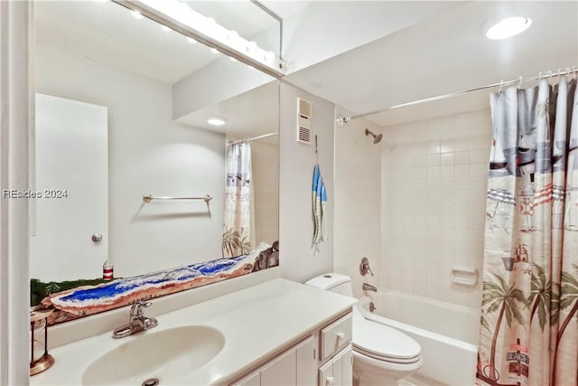 full bathroom featuring vanity, shower / bath combination with curtain, and toilet