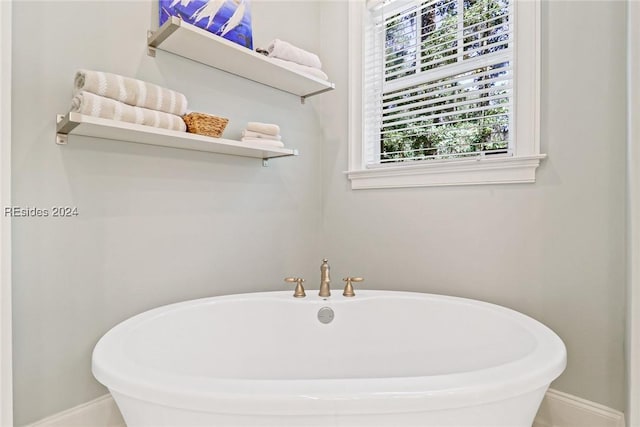 bathroom featuring a tub