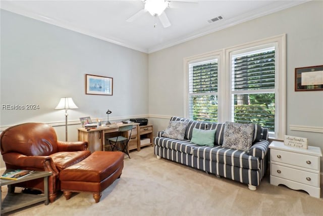 living room featuring ornamental molding, light carpet, and ceiling fan