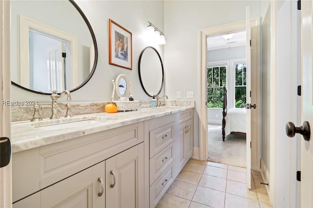 bathroom with vanity and tile patterned flooring