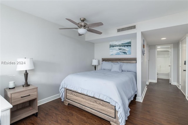 bedroom with dark hardwood / wood-style floors and ceiling fan