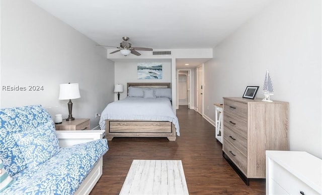 bedroom featuring dark hardwood / wood-style floors and ceiling fan