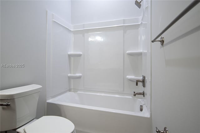 bathroom with toilet and tub / shower combination