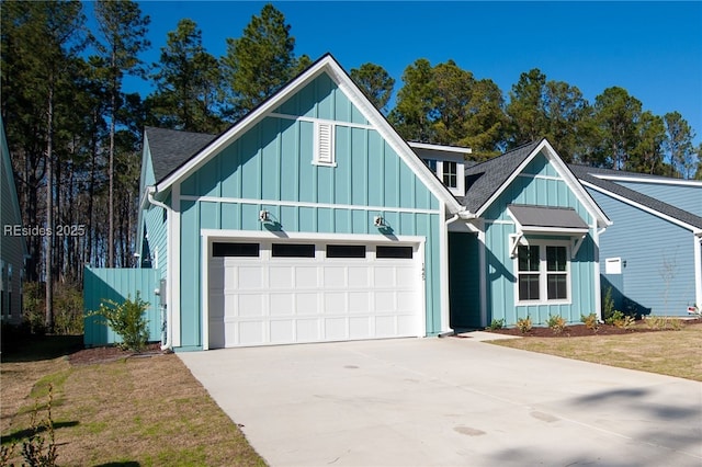 modern farmhouse with a garage and a front lawn