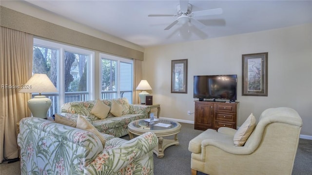 living room featuring carpet flooring and ceiling fan