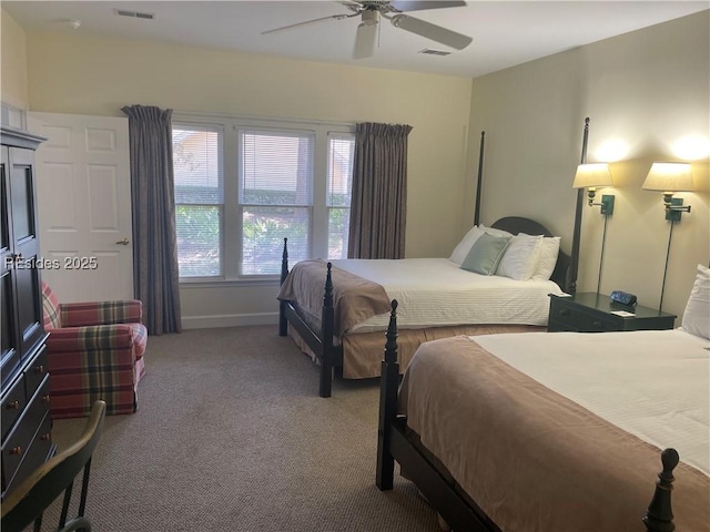 bedroom featuring ceiling fan and light colored carpet