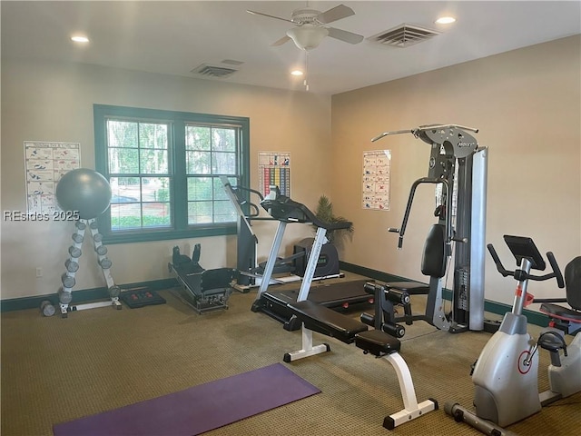 exercise area featuring ceiling fan and carpet flooring