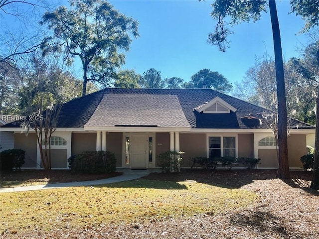 single story home with a front yard