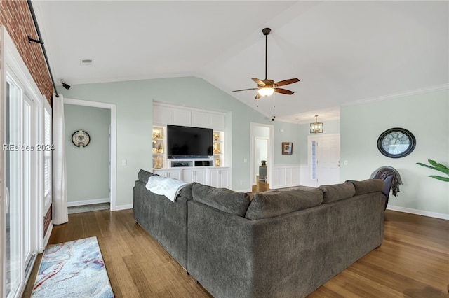 living room with ceiling fan, lofted ceiling, and hardwood / wood-style floors