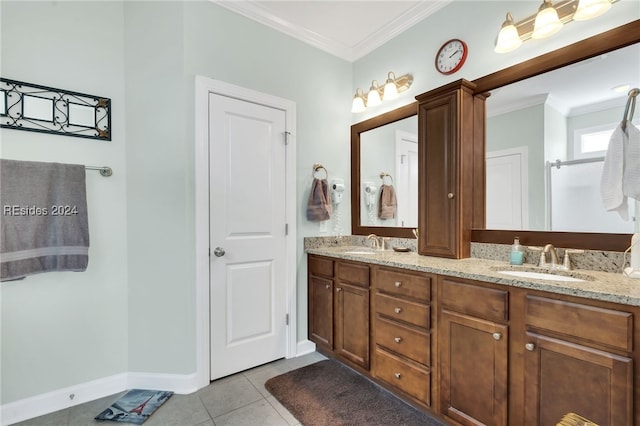 bathroom featuring vanity, ornamental molding, and tile patterned floors