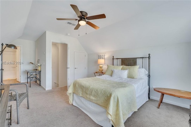 carpeted bedroom with lofted ceiling and ceiling fan