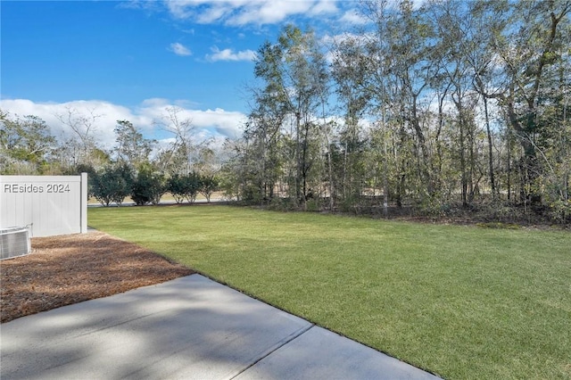 view of yard featuring central AC