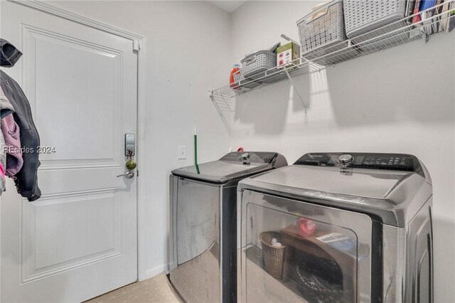 laundry area featuring washer and clothes dryer