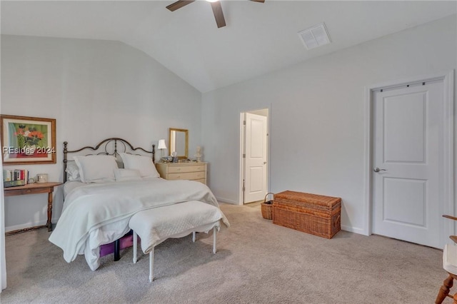 bedroom featuring ceiling fan, lofted ceiling, and light carpet