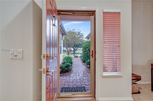 view of tiled entrance foyer