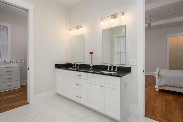 bathroom with vanity, wood ceiling, beam ceiling, and ceiling fan