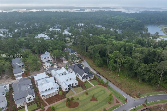 drone / aerial view with a water view