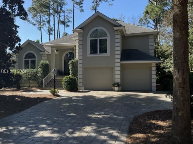 view of front of property featuring a garage