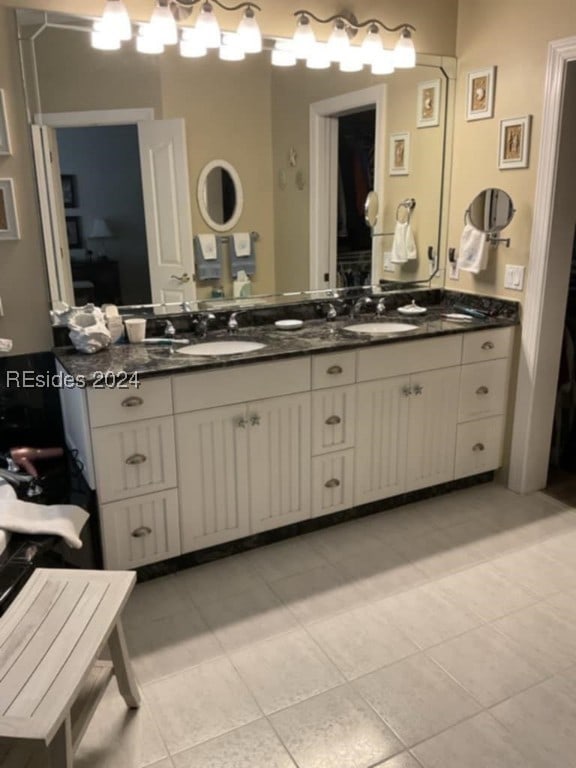 bathroom featuring vanity and tile patterned flooring