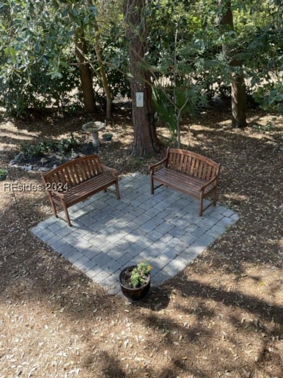 view of home's community with a patio