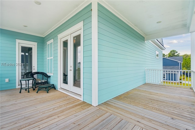 wooden terrace featuring french doors