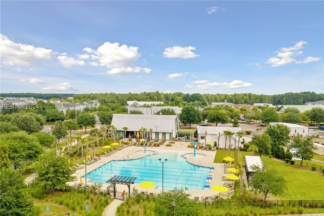 view of swimming pool with a patio area