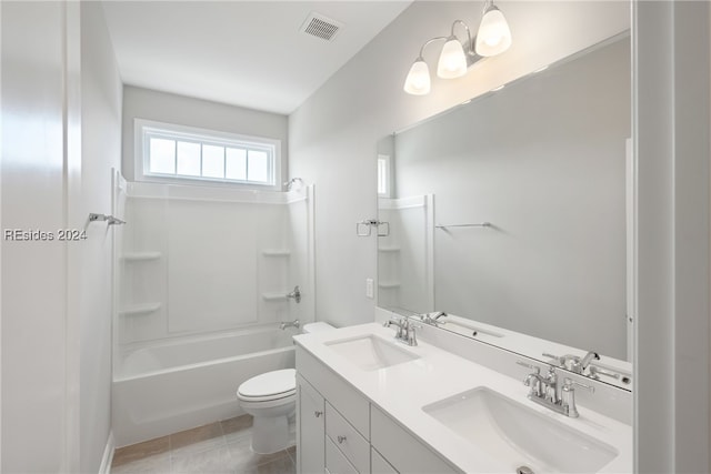 full bathroom with tile patterned floors, toilet, shower / bathing tub combination, and vanity