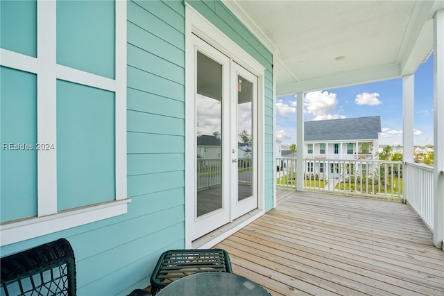 wooden terrace featuring french doors