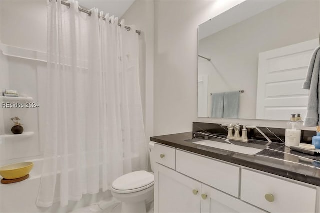 full bathroom with vanity, toilet, and shower / bath combo