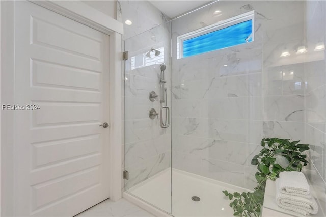 bathroom with walk in shower