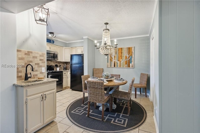 kitchen featuring backsplash, light tile patterned flooring, sink, and appliances with stainless steel finishes