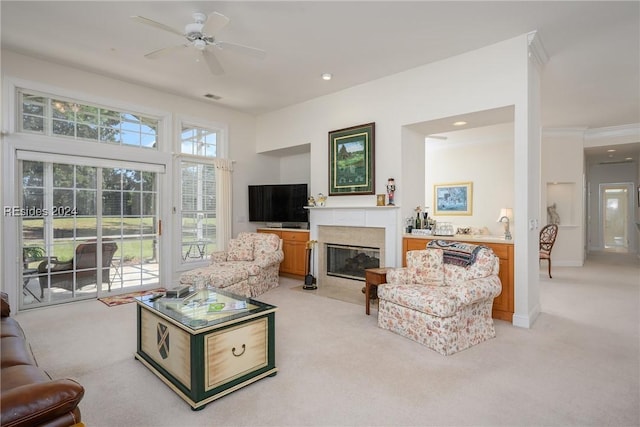 living room featuring ceiling fan and light carpet