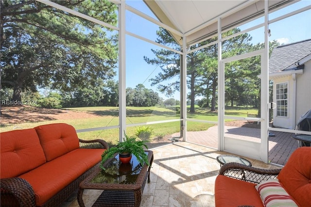 sunroom / solarium featuring a wealth of natural light