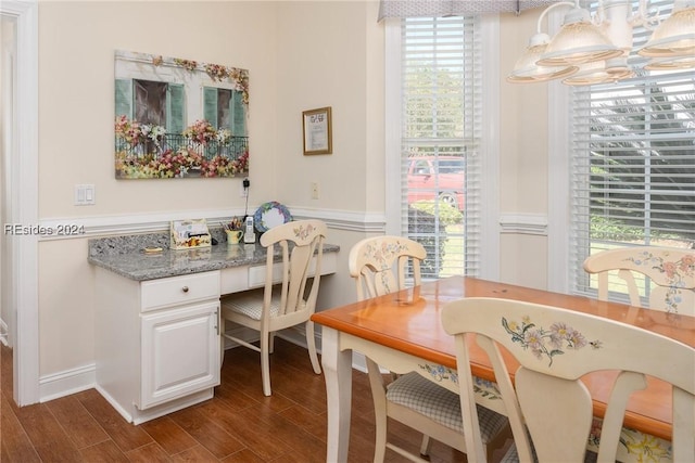 dining space featuring built in desk