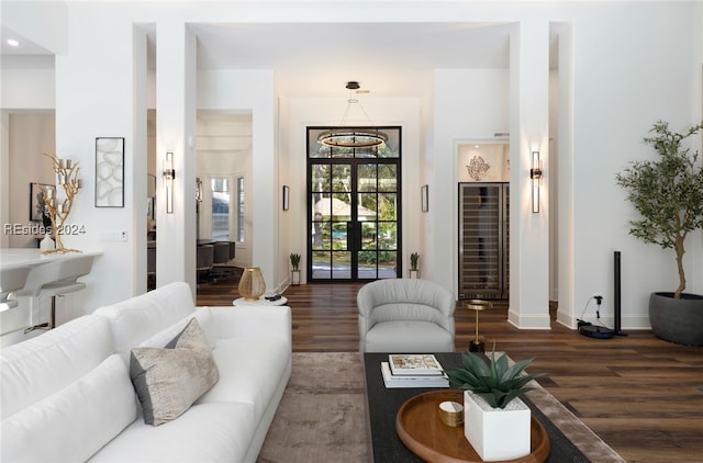 living room with dark hardwood / wood-style floors