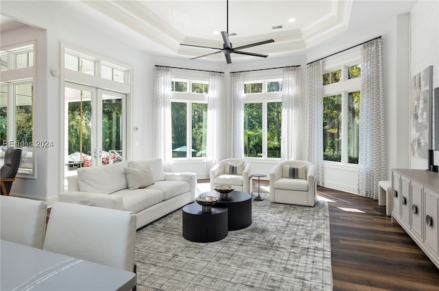 sunroom / solarium with a raised ceiling and french doors