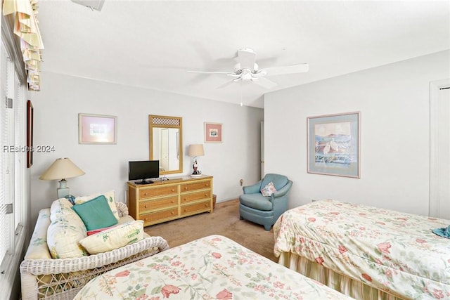 bedroom with light carpet and ceiling fan