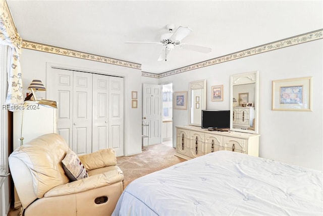 bedroom featuring light carpet, a closet, and ceiling fan