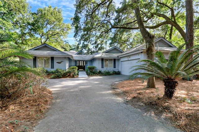 ranch-style home with a garage