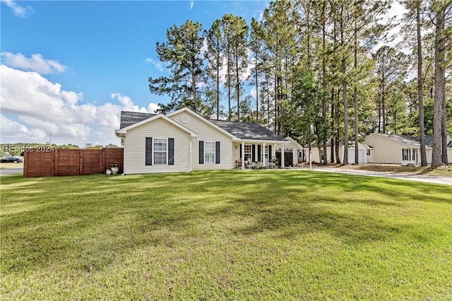 single story home with a front lawn