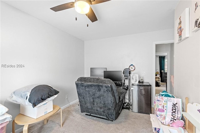 office area with carpet flooring and ceiling fan