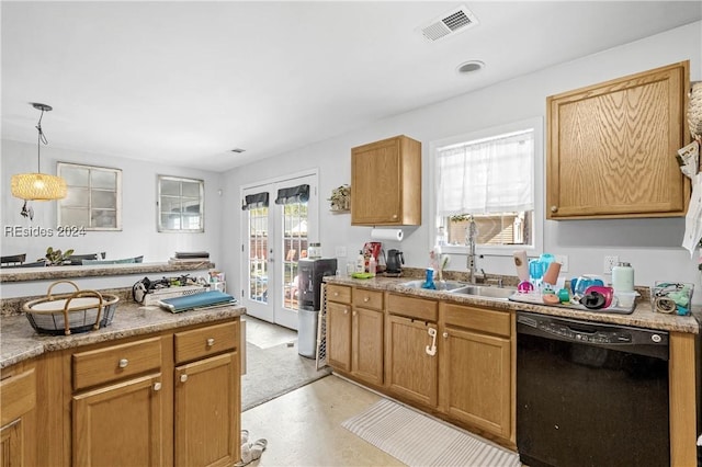 kitchen featuring french doors, black dishwasher, sink, and hanging light fixtures