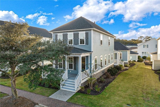 view of front of home with a front lawn