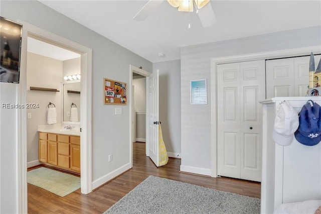 bathroom featuring ceiling fan, vanity, and hardwood / wood-style floors