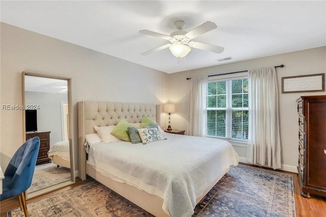 bedroom featuring ceiling fan and wood-type flooring