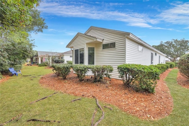 ranch-style home with a front yard