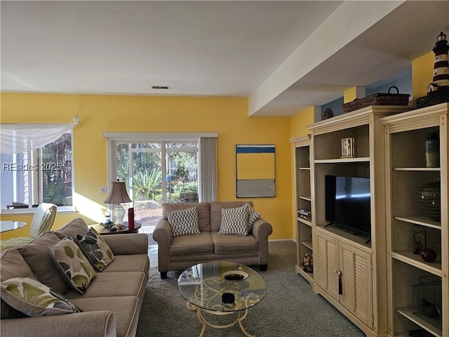 living room featuring carpet floors