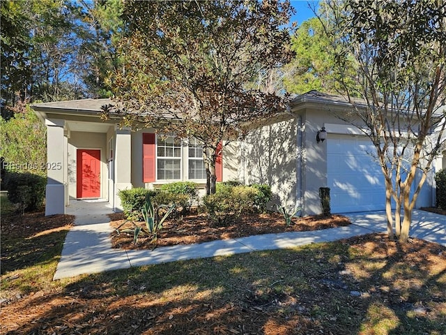 obstructed view of property with a garage