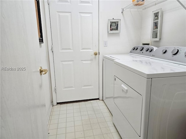 clothes washing area with independent washer and dryer